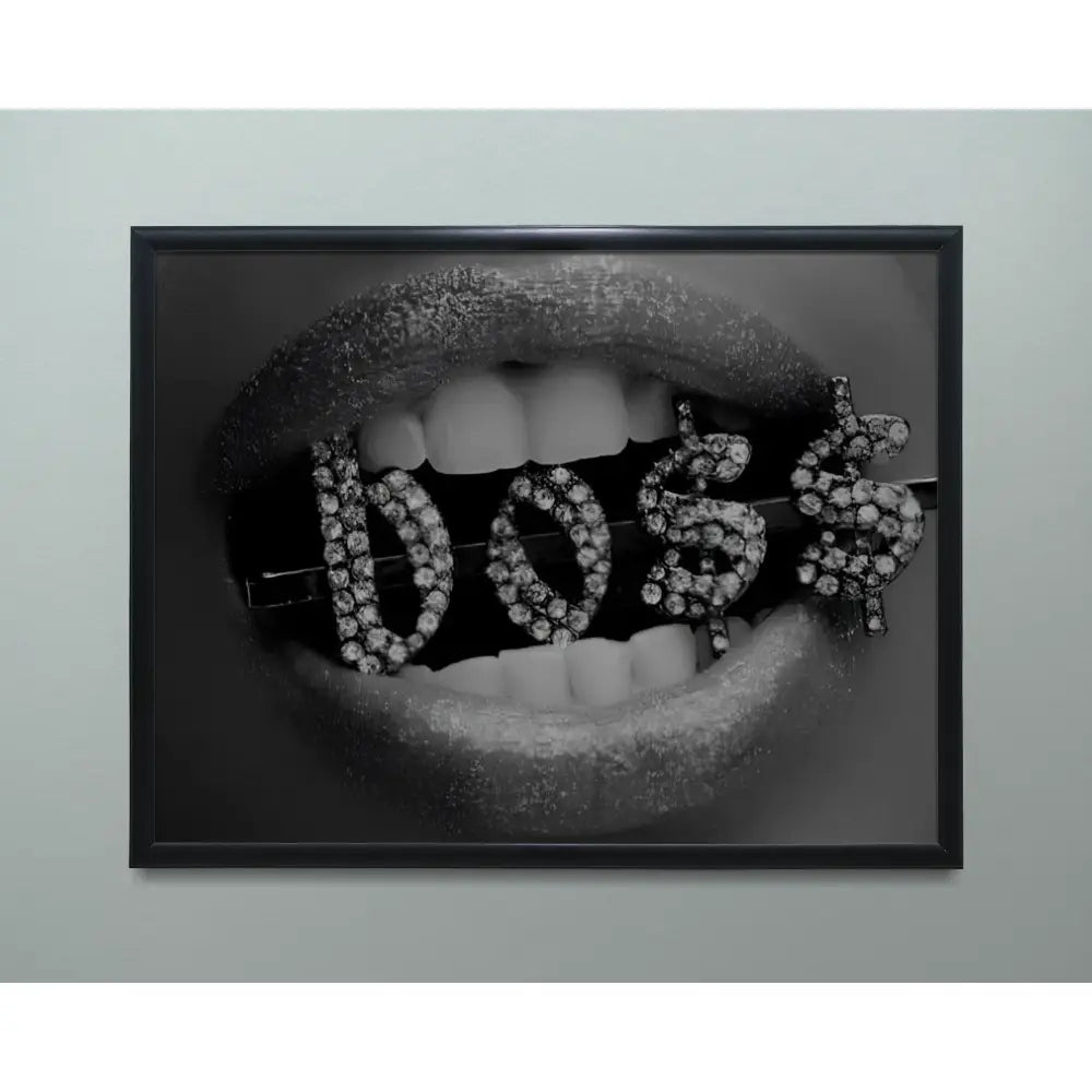 Framed artwork of a mouth with diamond-studded letters spelling 'DOS' on a gray background