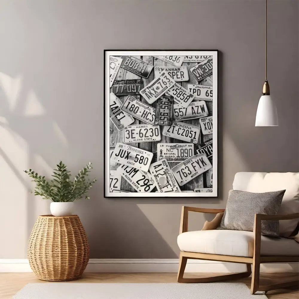 Framed artwork of license plates on a wall in a living room.